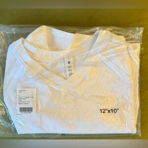 Lululemon Athletica Nulux Cropped Tennis Short Sleeve Tee Size 6. NWT